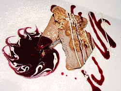Pastry with the ice and a coulis