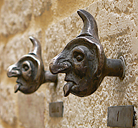 doorbell sculpture with tongue out venice italy